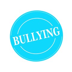 BULLYING white stamp text on circle on blue background