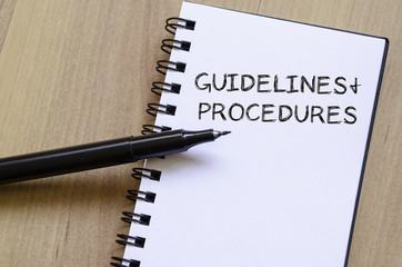 Guidelines and procedures write on notebook - 96939873