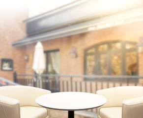 Table Top And Blur Building Of Background