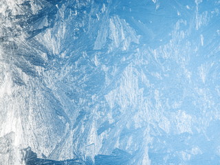 Obraz premium Ice crystals on the surface of the window.
