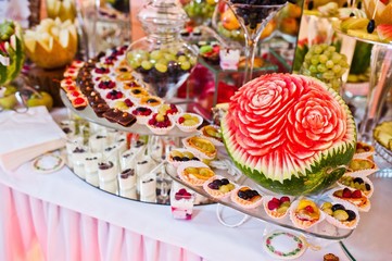 Wedding reception. Table with fruits and sweets