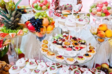 Fototapeta na wymiar Wedding reception. Table with fruits and sweets