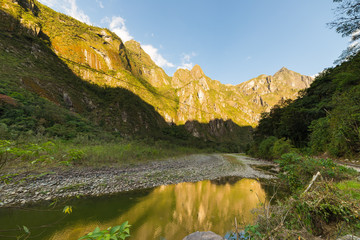 Fototapeta na wymiar Urubamba River and Machu Picchu mountains, Peru