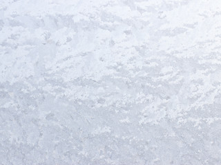 Frosty natural pattern on winter window.