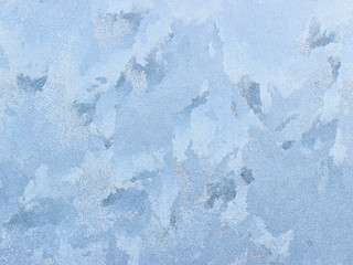 Frosty natural pattern on winter window.