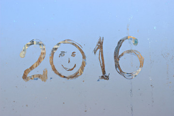 "2016" written on frosty winter window.
