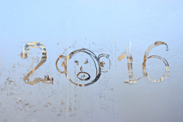 "2016" written on frosty winter window.