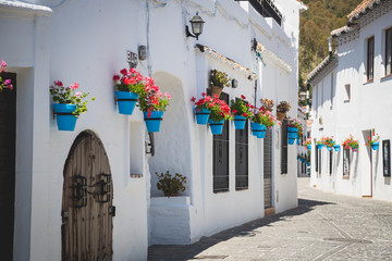 Picturesque street of Mijas. Charming white village in Andalusia - obrazy, fototapety, plakaty