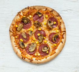 Delicious italian pizza served on wooden table