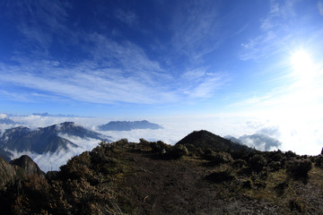 beautiful rolling clouds and mountain landscape