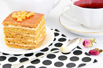 Cake with Condensed Milk, Nuts and Honey. Tea, Tableware.