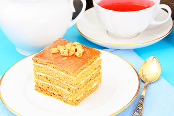 Cake with Condensed Milk, Nuts and Honey. Tea, Tableware.