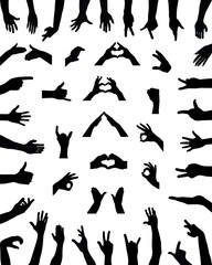 Fototapeta na wymiar Black silhouettes of various positions of hands, vector