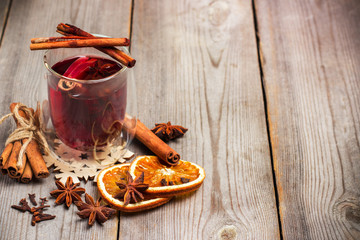 Christmas mulled wine on a rustic wooden table
