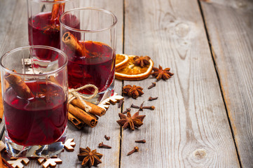 Christmas mulled wine on a rustic wooden table