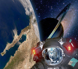 Astronaut helmet et alien extraterrestrial sci fi space earth saturn planet. Elements of this image...