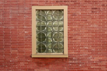 Modern Red Brick Wall With Green Glass Block Ornamental  Window