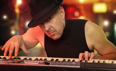 Man playing synthesizer