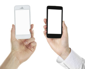 Hands holding black and white smart phones, isolated on white