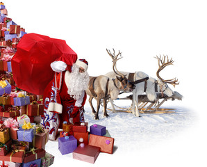 Santa Claus and his reindeer with gifts