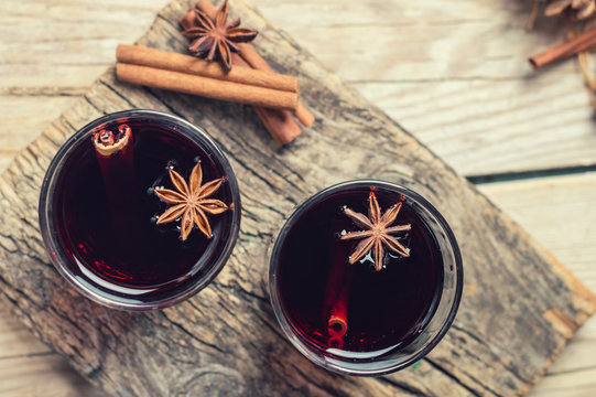 spicy mulled red wine with spices in glass glasses. top view