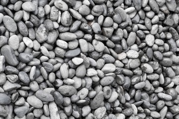 The Horizontal Texture of Black Pebbles Background