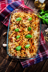Casserole fusilli pasta with sausage, zucchini and cheese