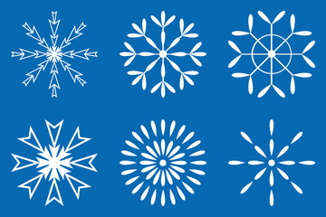 white snowflakes set sign isolated on blue background