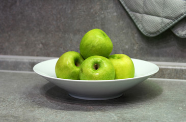 green apples on a plate