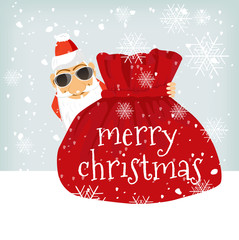 Santa Claus standing near Christmas bag
