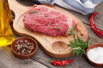 Raw beef steak and spices