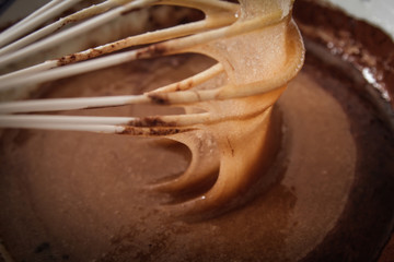 whisk with sugar and cocoa. the ingredients for the cake