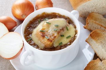 French cuisine. Onion soup served in a white tureen