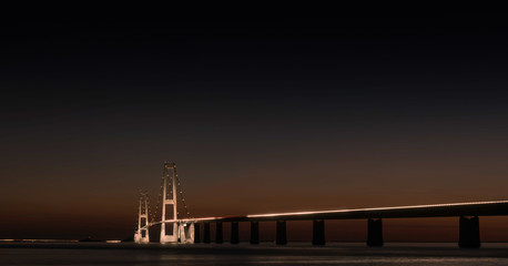 Sunset behind Storebælt bridge © micma40