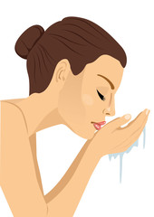woman washing her face