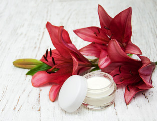 Face cream with lily flowers