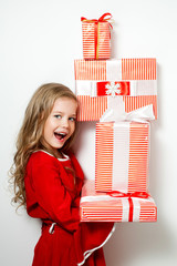 Happy girl with red gift boxes