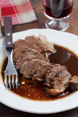 Duck meat on a rustic table