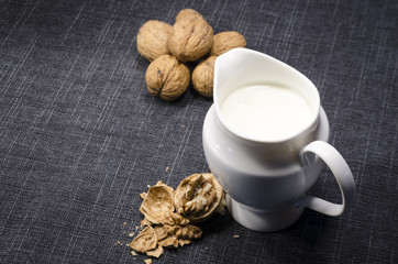 jug of milk and walnuts