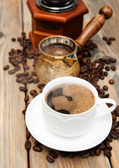 coffee cup and metal turk