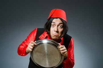 Man wearing red fez hat