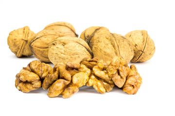 Walnuts isolated on white background, foreground focus