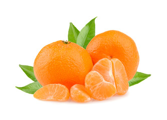 Tangerines with leaves and slices on white background