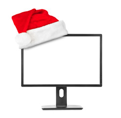 Computer monitor and Santa Claus red christmas hat