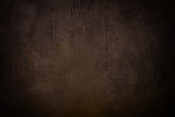 dark brown grunge background or texture with black vignette bord