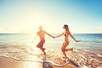 Happy Sunset Couple at the Beach