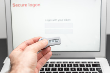Secure token in front of a laptop