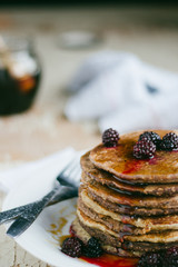 Whole wheat oatmeal pancakes with blackberry and syrup
