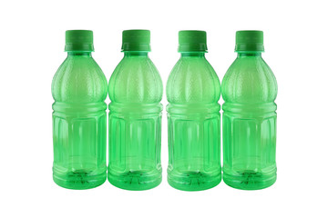 Green of bottle drink isolated on white.