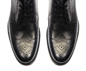 Tip of male shoes isolated on white